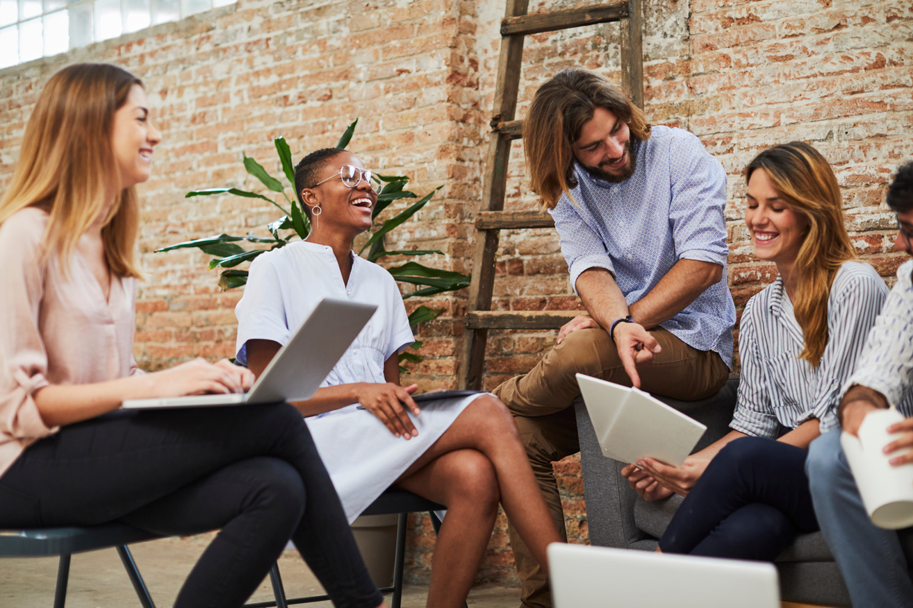 Team work, meeting in new office.
